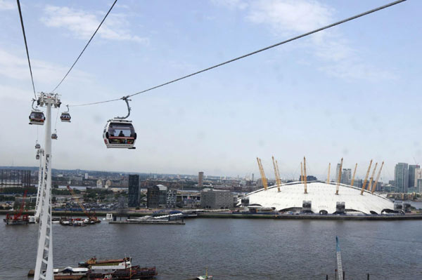 London's first cable car service opened its doors to the public on Thursday, a spectacular ride high across the River Thames near the Olympic Park which will help visitors to the Games avoid any jams on the ground. London's first cable car lifts off
