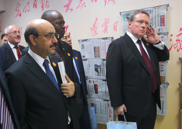 Masood Khan (left), Pakistan's ambassador to China, and other diplomats visit the Publicity Department of the CPC's Central Committee in Beijing. Institutions open the door to scrutiny
