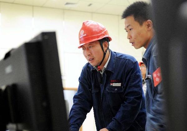 尤天軍：26年執著堅守　苦修成“工人教授”