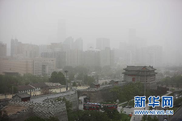 沙塵襲京白晝?nèi)缫?最大沙塵刮出今年最臟空氣