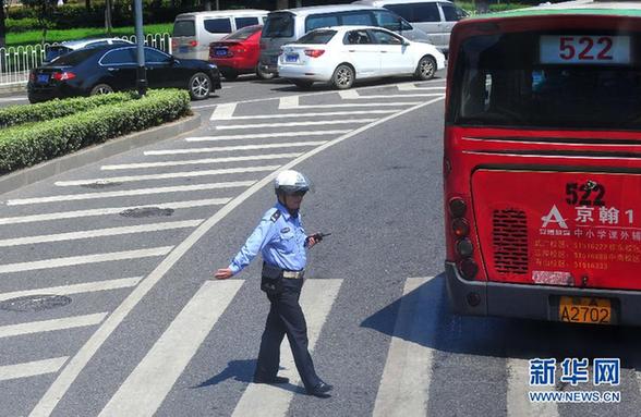 [人物寫真]“烈日下，我們堅守崗位”