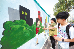 百米工地圍墻變身“創城墻”