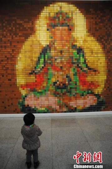 山西民眾拼繪巨型文殊菩薩像祈愿國(guó)富家和