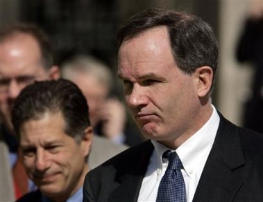 Special Counsel Patrick Fitzgerald, right, leaves the federal courthouse Wednesday, Oct. 26, 2005 in Washington after meeting for three hours with the federal grand jury investigating the leak of a CIA officer's identity.