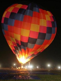 Indian millionaire Vijaypat Singhania prepares to take off his hot air balloon in Bombay, India, Saturday, Nov. 26, 2005.