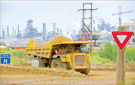 Sinopec profit up, explores acquisitions