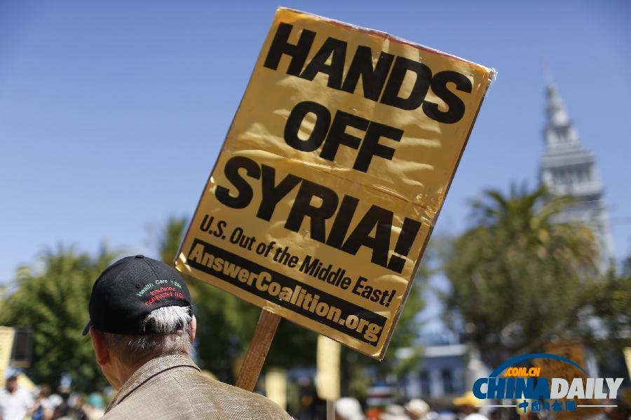 美國多地反戰(zhàn)游行 要求國會否決軍事打擊敘利亞提案