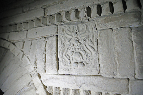 A sculptured brick found in a Tang Dynasty (AD 618-907) tomb in Jiuquan, a city in northwest Gansu, 700 kilometers from Lanzhou. Secrets of Hexi Corridor