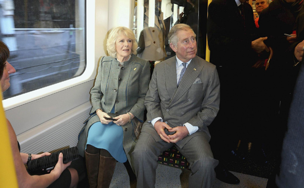 Prince Charles and Camilla surprise 'Tube' passengers