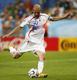 France's Zinedine Zidane shoots from the penalty spot to score against Portugal during their World Cup 2006 semi-final soccer match in Munich July 5, 2006.