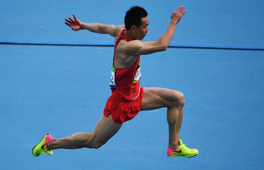 China's Dong Bin wins triple jump bronze