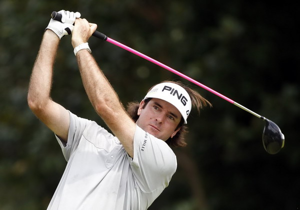 Bubba Watson of the US watches his tee shot on the fifth hole during a practice round for the 93rd PGA Championship golf tournament at the Atlanta Athletic Club in Jones Creek, Georgia, Aug 9, 2011. Shaping shots the allure for big-hitting Bubba