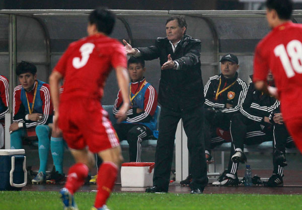 China's coach, Jose Antonio Camacho, in action during the match against Iraq in Changsha on Friday. CFA's coaching conundrum