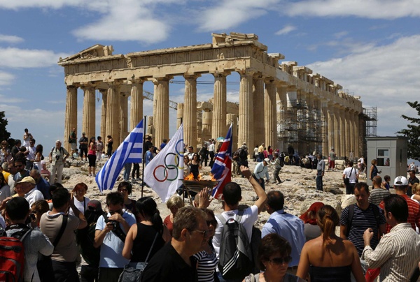 倫敦奧運圣火交接儀式在希臘舉行 李寧點燃圣火壇