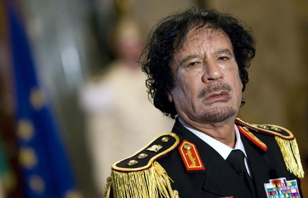 Libya's leader Muammar Gadhafi looks on during a news conference at the Quirinale palace in Rome in this June 10, 2009 file photo. Libya rebels say they control parts of Tripoli