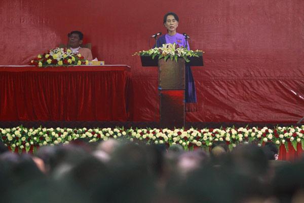 Myanmar's pro-democracy leader Aung San Suu Kyi delivers her speech at the National League for Democracy party's (NLD) congress in Yangon March 10, 2013. Aung San Suu Kyi re-elected opposition leader